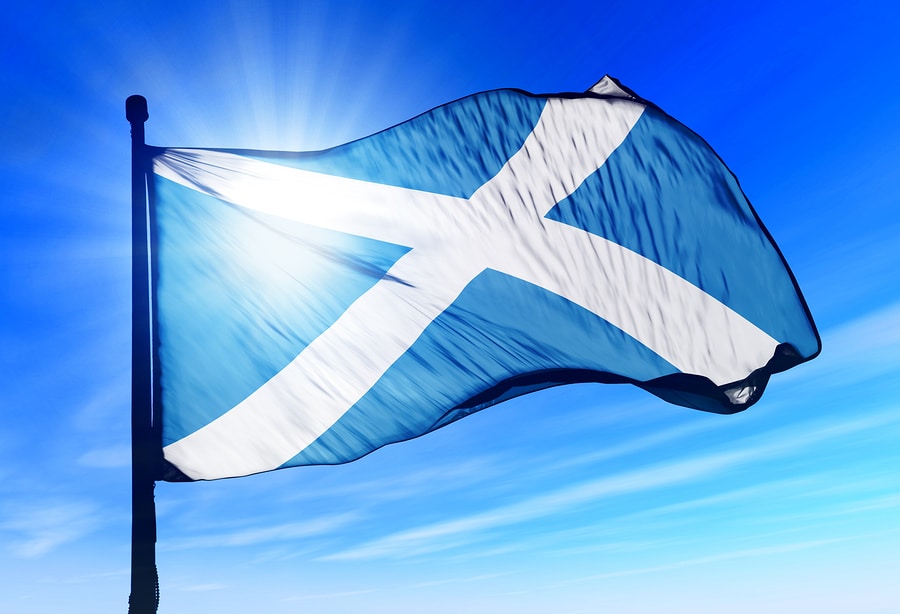 bigstock-Scotland-flag-waving-on-the-wi-57979346